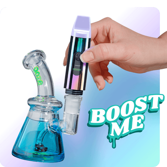 Person attaching the Rainbow Booster extract vape to dab rig
