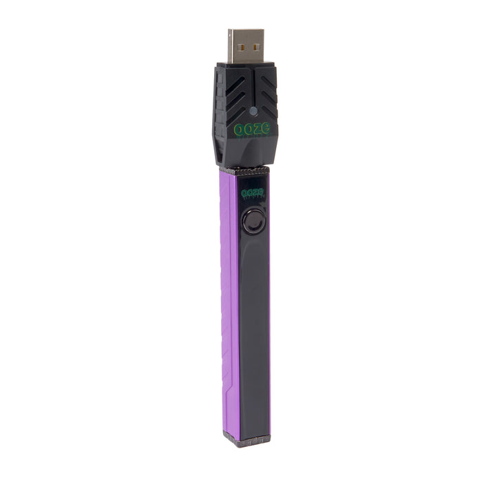 angled view of purple Quad 2 square vape including USB charger